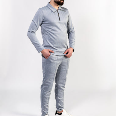 Twee delige poloshirt met lange mouwen en herringbone pantalon